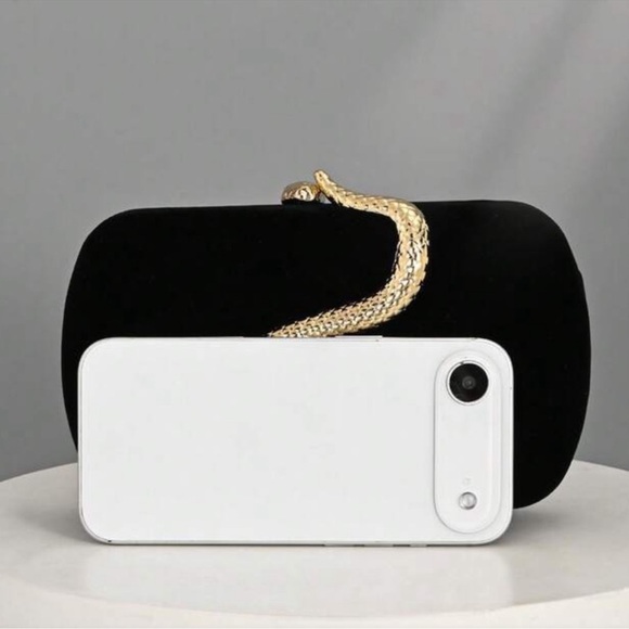 Elegant Black Clutch with Gold Snake Design Accent